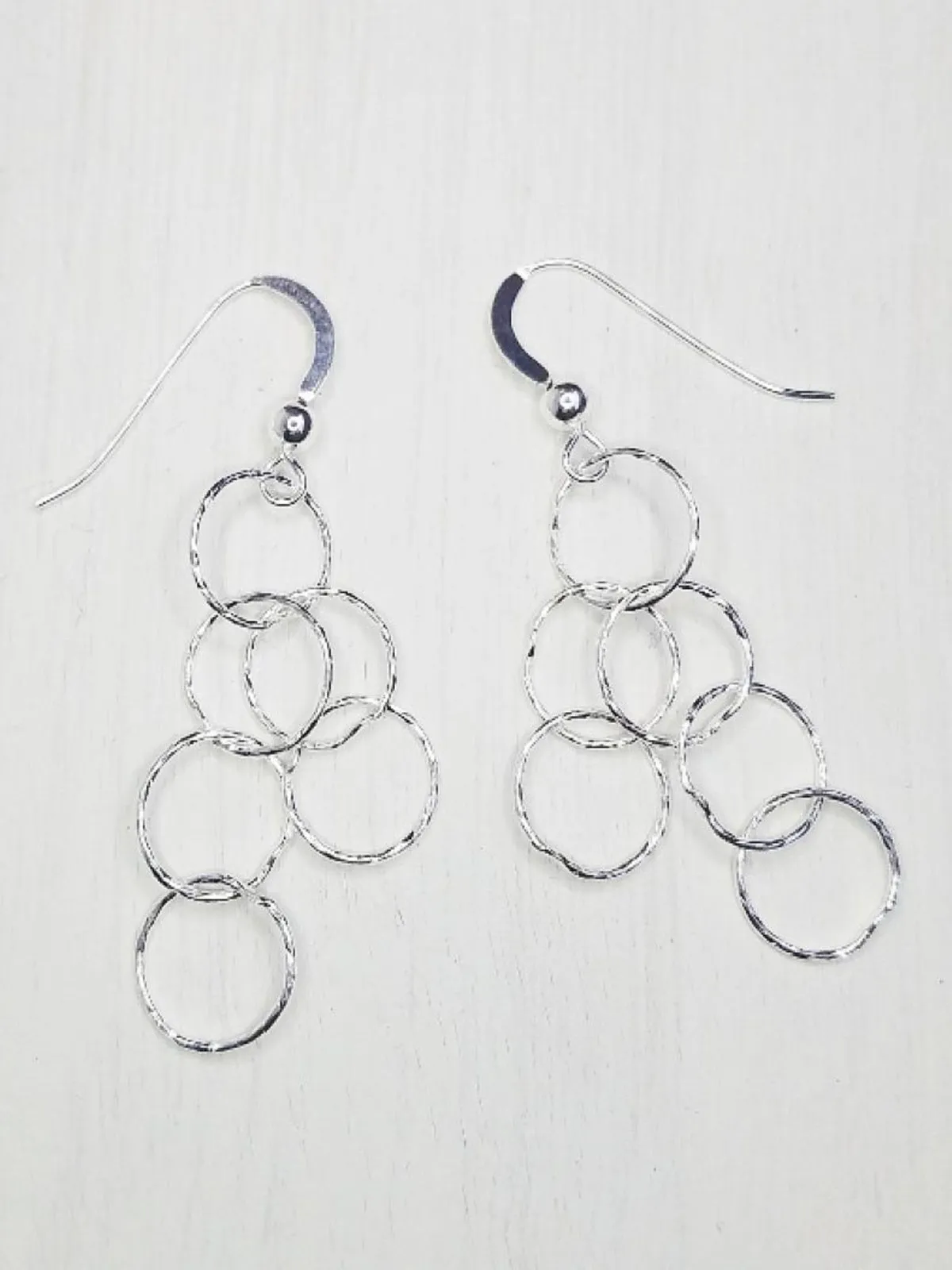 Linked Diamond Cut Circle Dangles