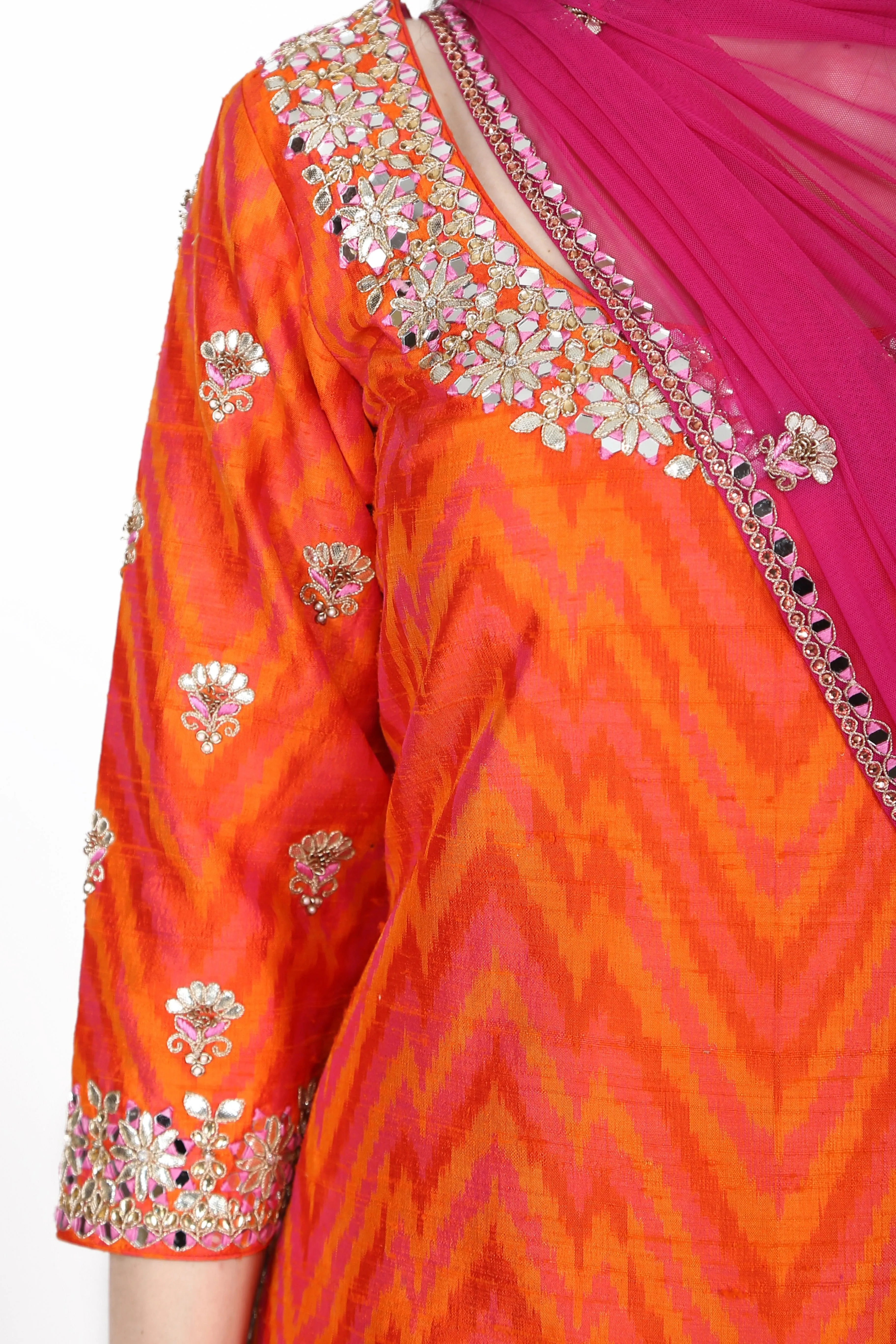 Orange and Magenta Kurta set.